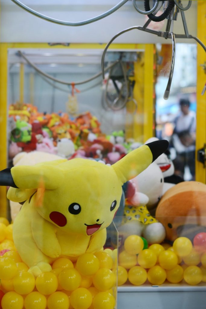 A toy grabber with a pikachu inside 